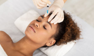 Woman receiving botox injection